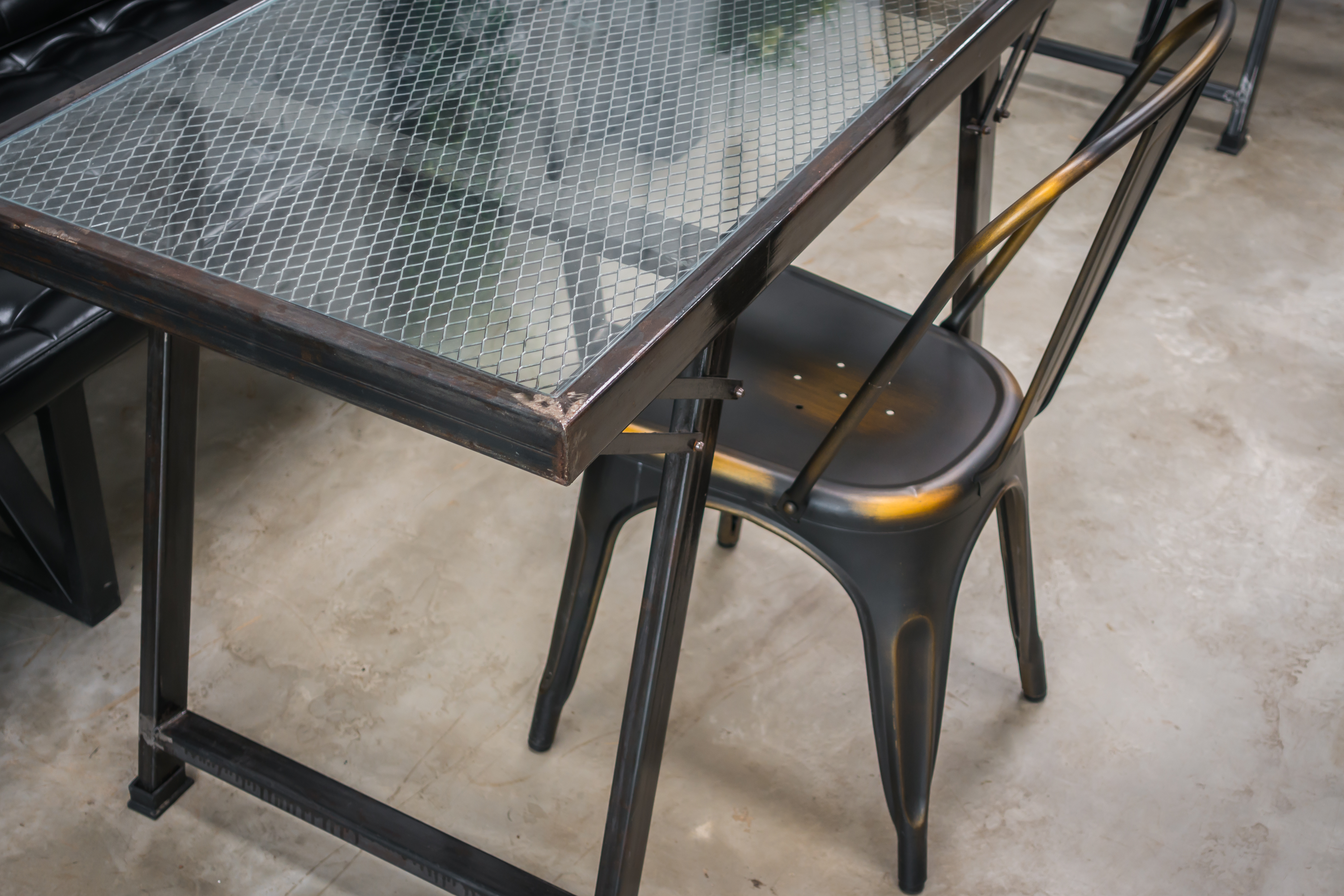 Tables and chairs in restaurant .
